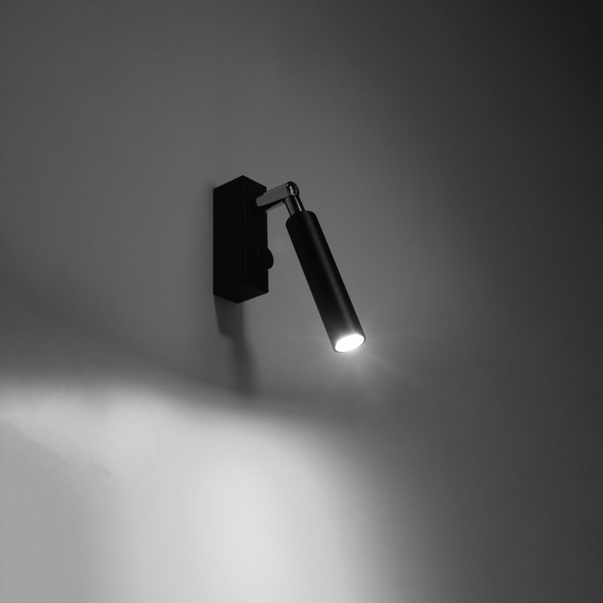 Modern adjustable black tube wall light – Norythra