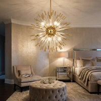 Lustre moderne en métal doré et verre cristal pour salons – Stellario