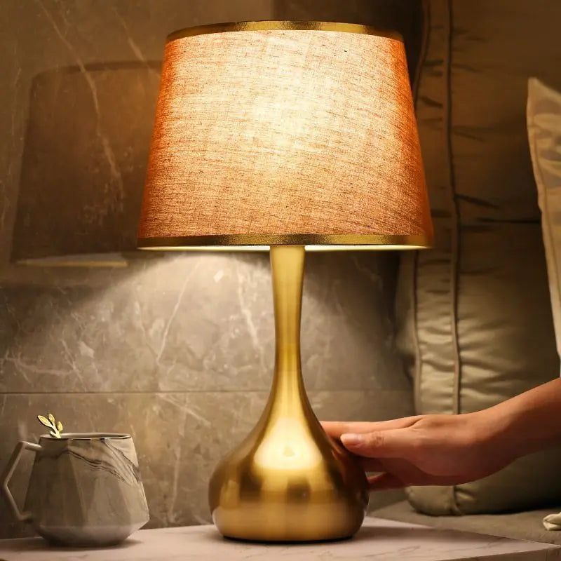 Sophisticated table lamp Luminis golden metal base fabric shade cozy ambiance - view 11
