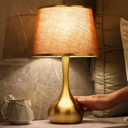 Sophisticated table lamp Luminis golden metal base fabric shade cozy ambiance - view 11