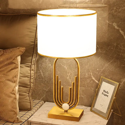 Table Lamp Raynova Gold Design with Architectural Base and Cylindrical Fabric Shade - View 8