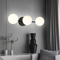 Applique murale LED en métal noir pour chambre – Novaluce