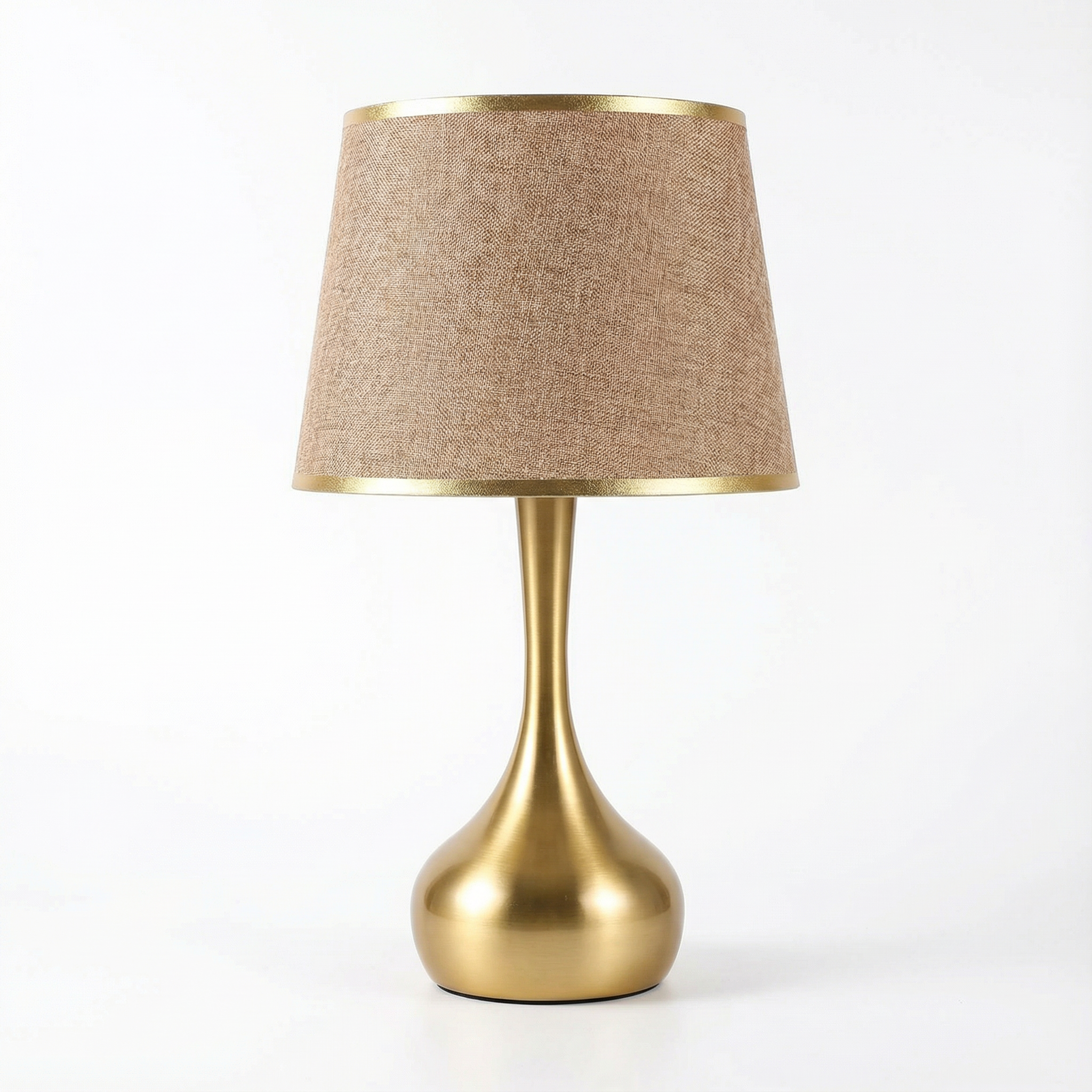 Sophisticated table lamp Luminis with gold metal base and fabric shade in cosy ambiance – view 1